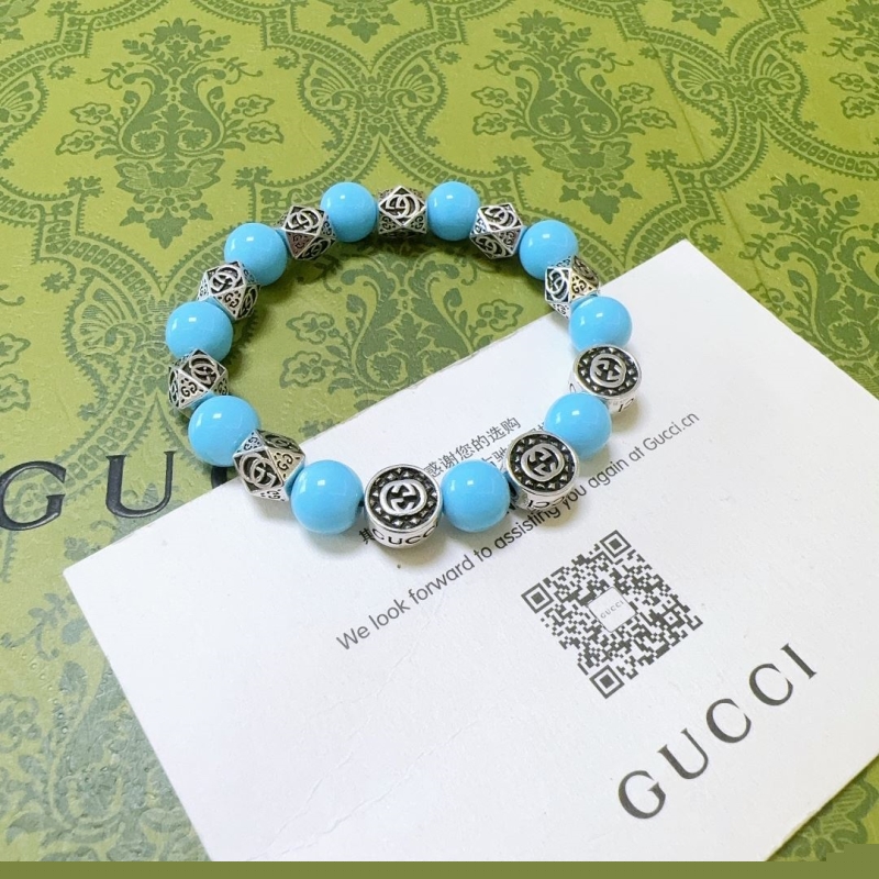 G*u*i bracelets